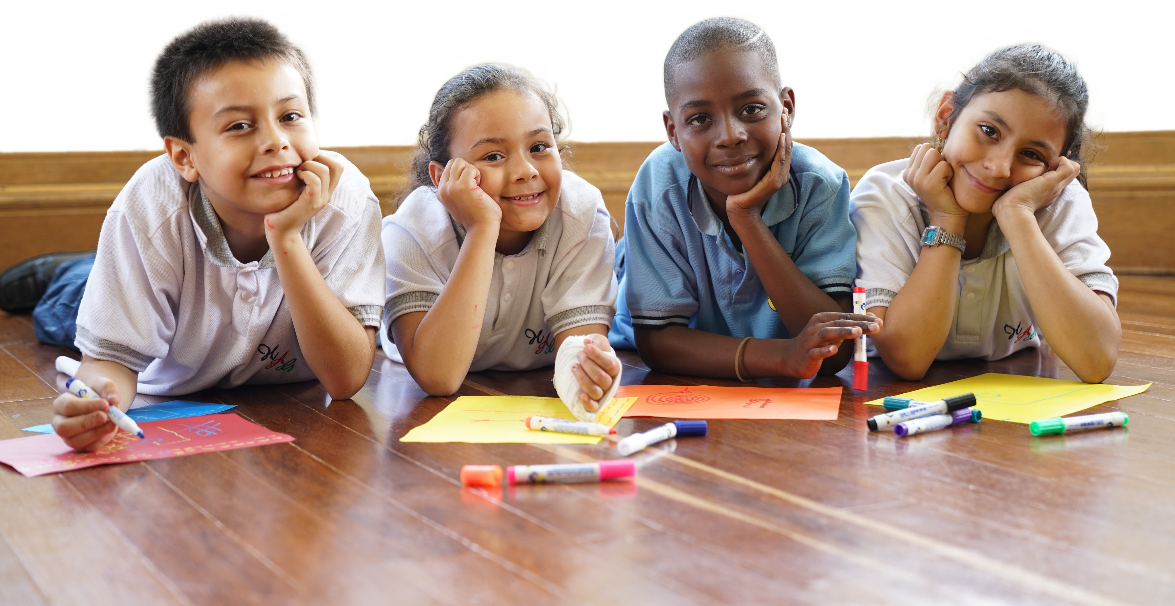 Some children at one of Let the Children Live!'s centres