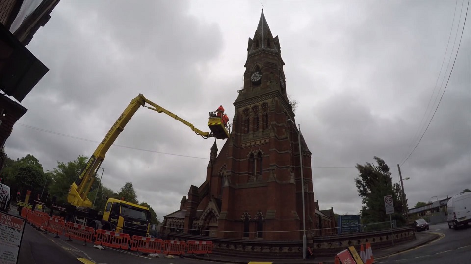 A cherry-picker being used to inspect the condition of the tower at St Luke's church, Blakenhall in 2017